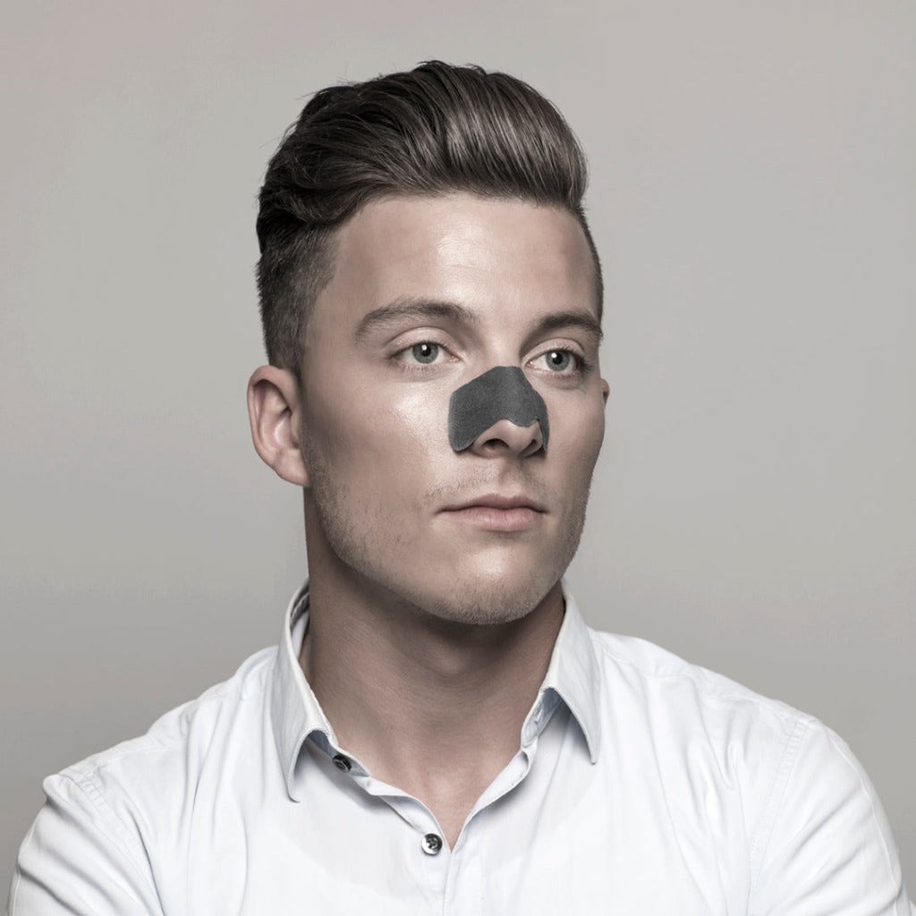 Male model wearing the step two of STARSKIN Sunset Strips - two pack on his nose