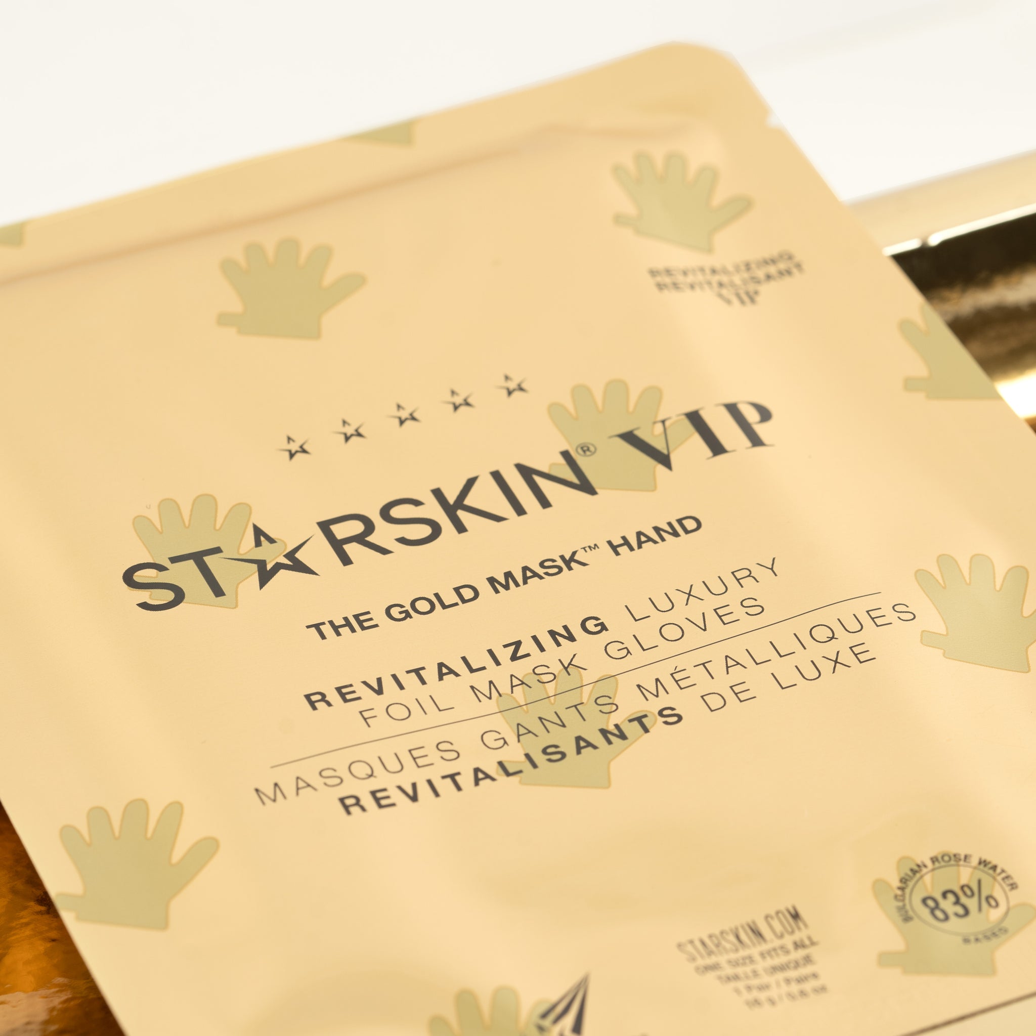 Starskin Gold Mask - Hand product sachet close up. 