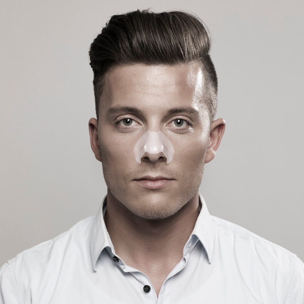 Male model wearing the step three of STARSKIN Sunset Strips - two pack on his nose