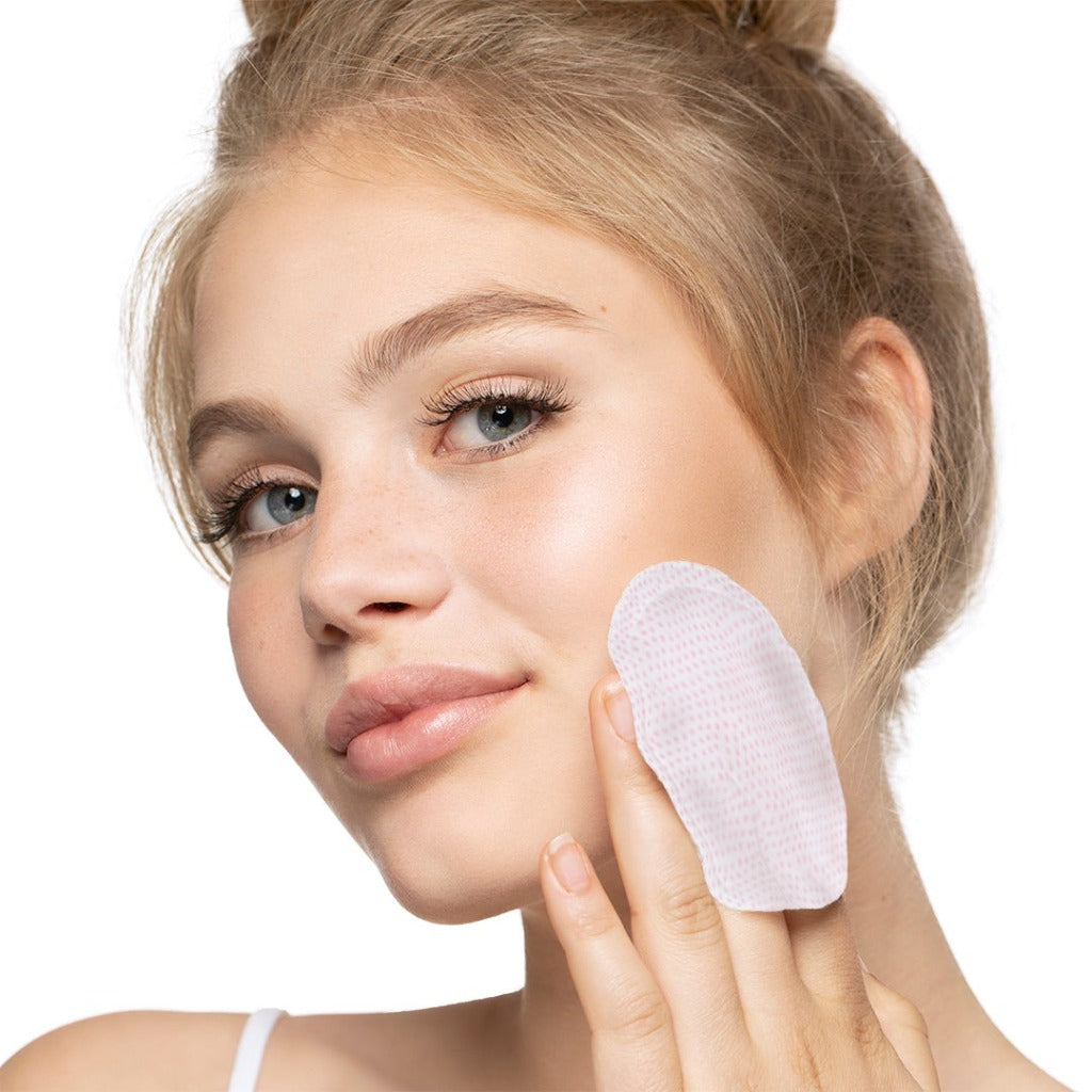 Model showing how to use the STARSKIN VIP 7-second Luxury All-Day mask pad