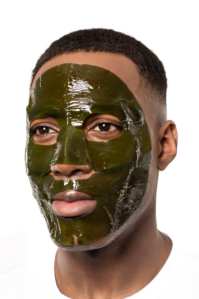 Male model wearing the STARSKIN ORGLAMIC Sea Kelp mask