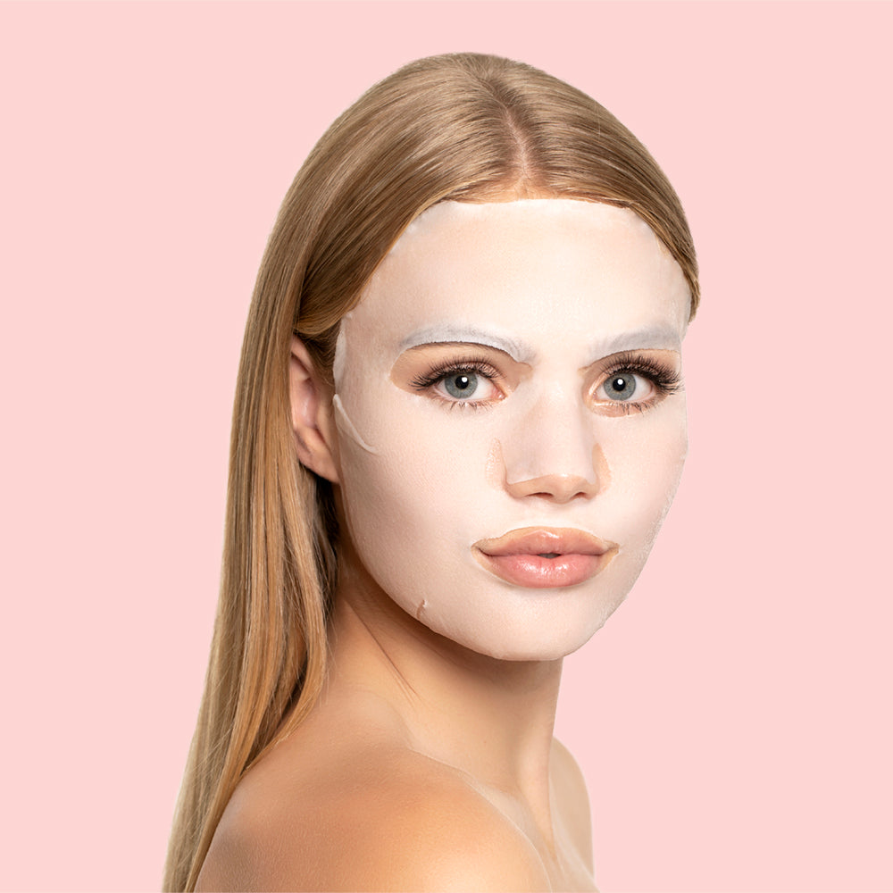 Image of a model wearing the STARSKIN ORGLAMIC Pink Cactus Oil Mask on her face
