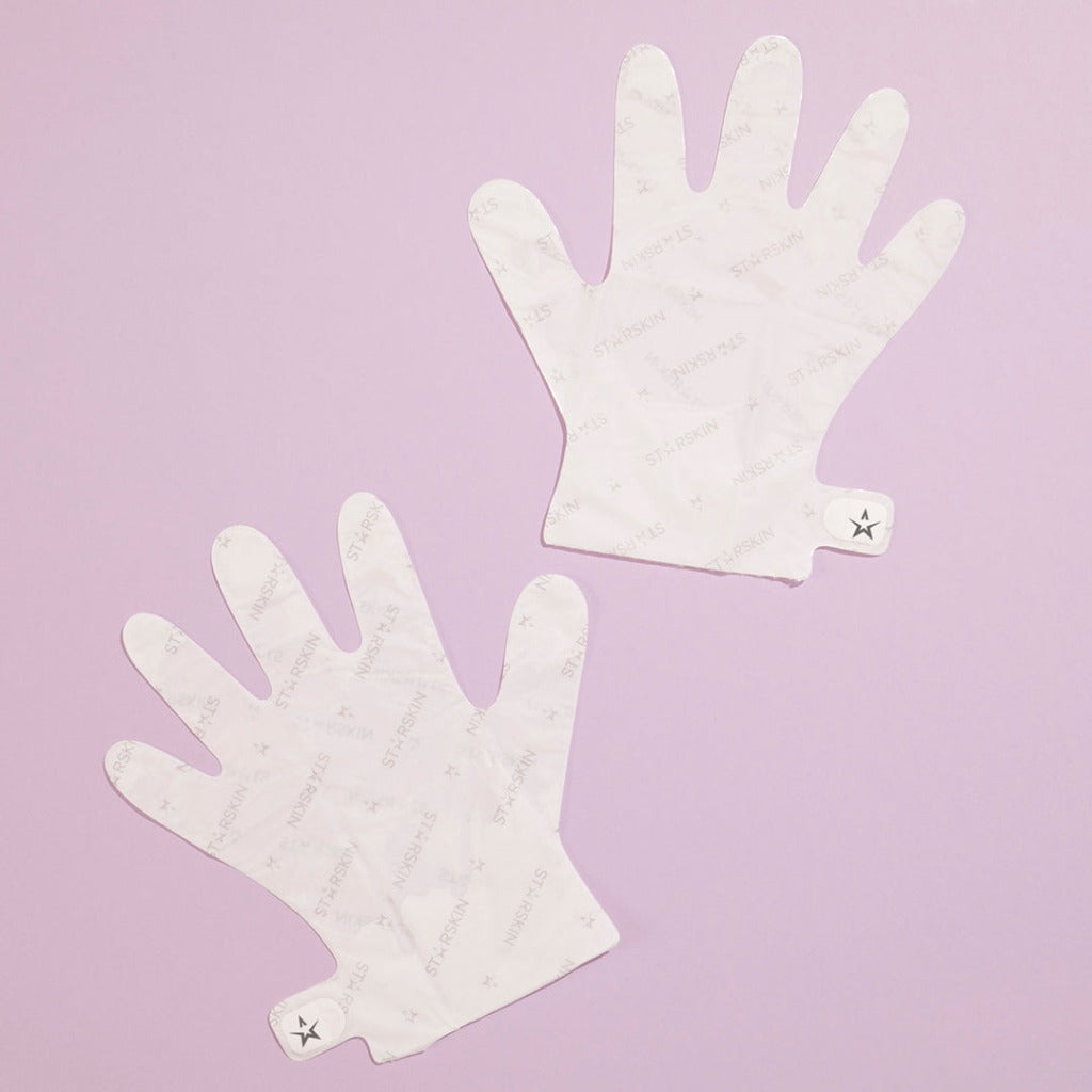 Atmospheric image of a lilac background and a pair of STARSKIN Hollywood Hand Model laying on top of it